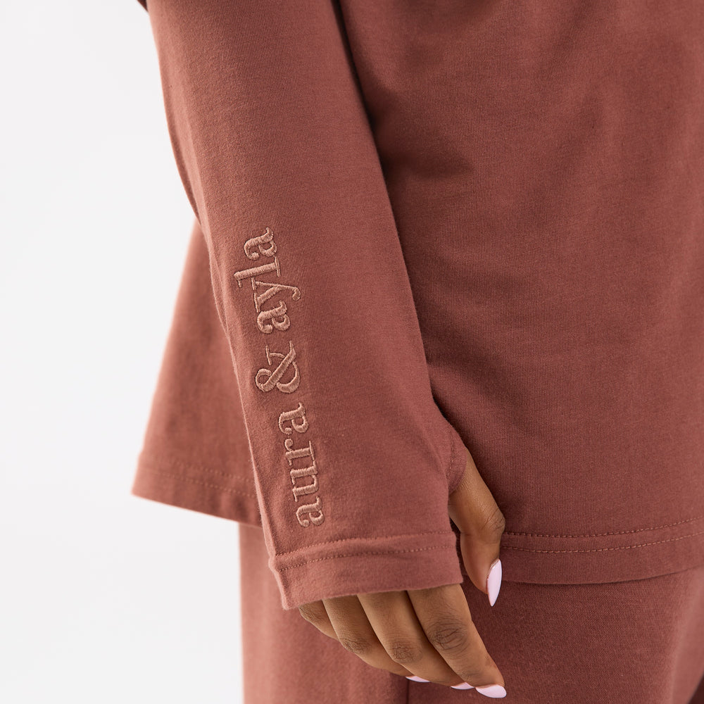 
                      
                        Copper Brown Embroidered High Neck Top
                      
                    