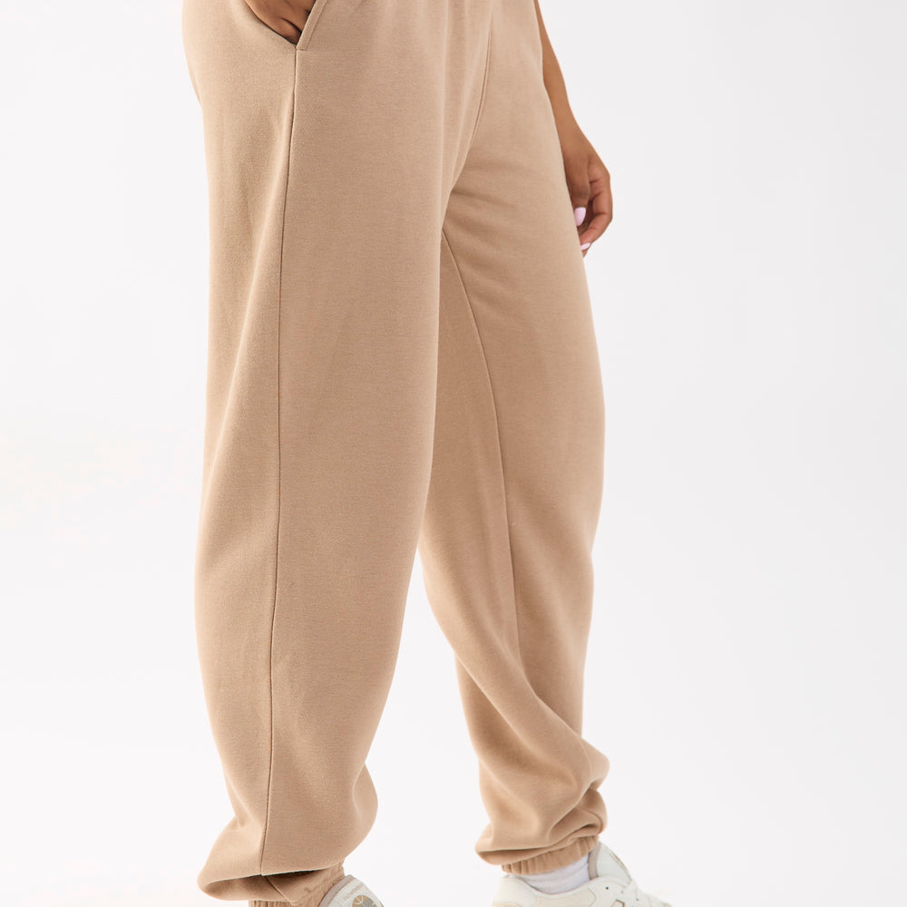 
                      
                        Camel Embroidered Cuffed Joggers
                      
                    