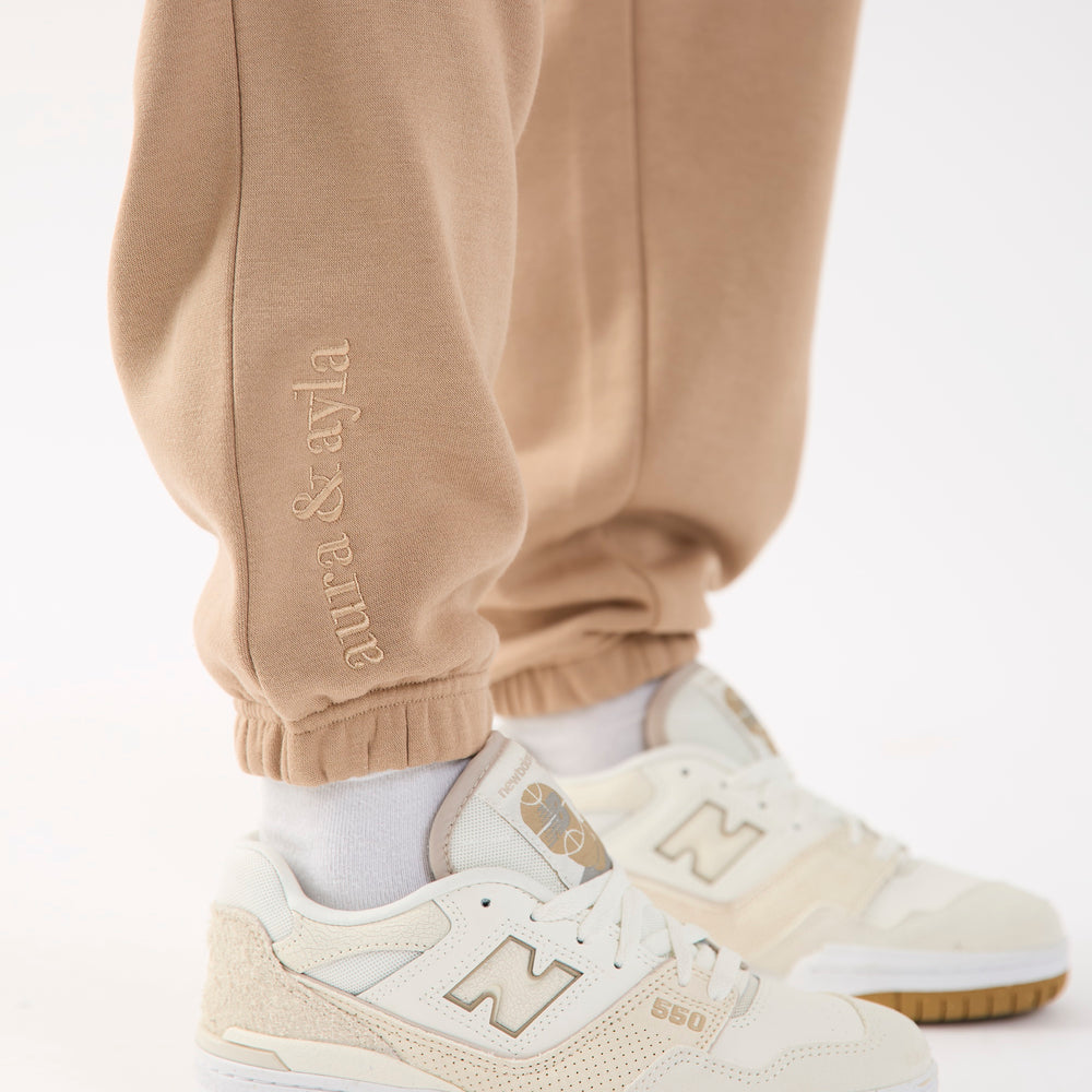 
                      
                        Camel Embroidered Cuffed Joggers
                      
                    